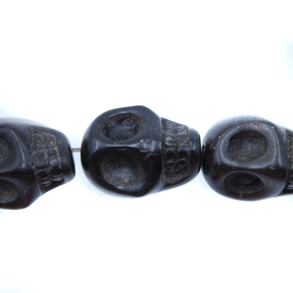 5ST50-BK: 23x18mm Black Magnesite Skull Beads 15.5"