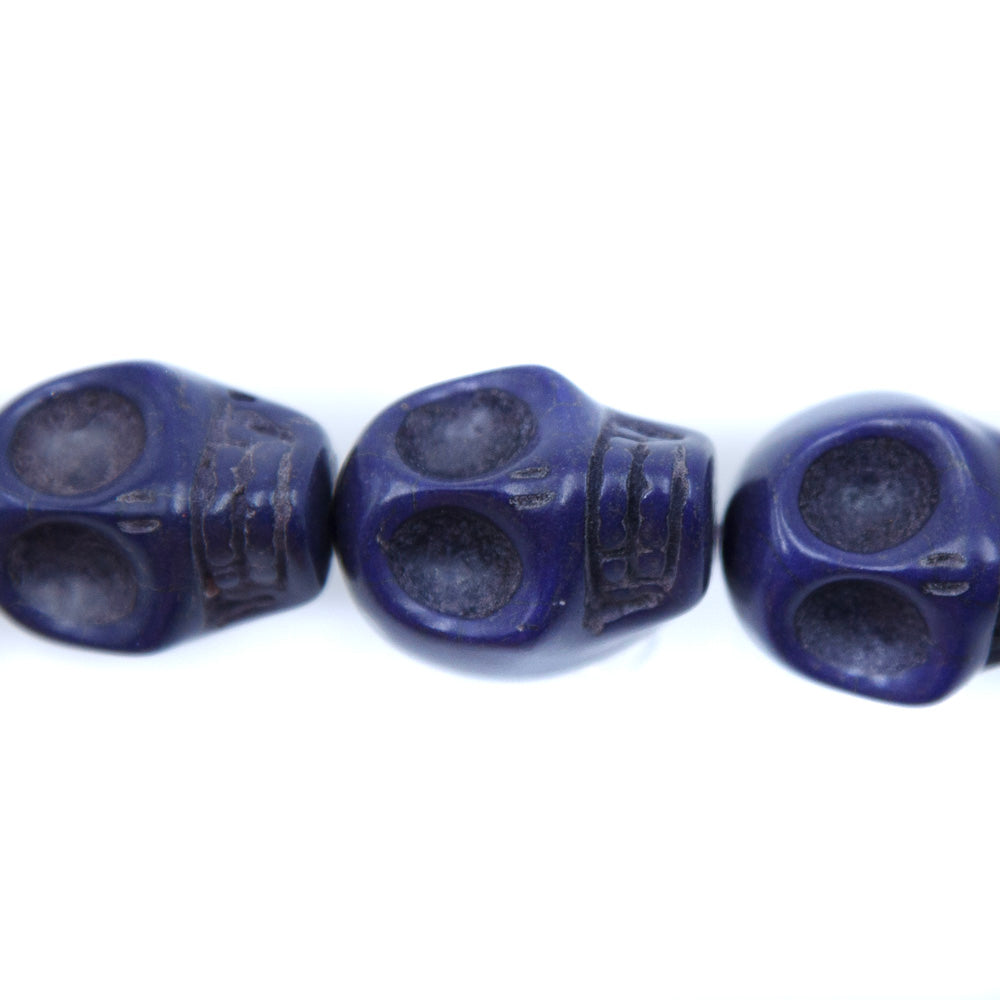 5ST50-DB: 23x18mm Lapis Magnesite Skull Beads 15.5"