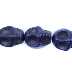 5ST50-DB: 23x18mm Lapis Magnesite Skull Beads 15.5"
