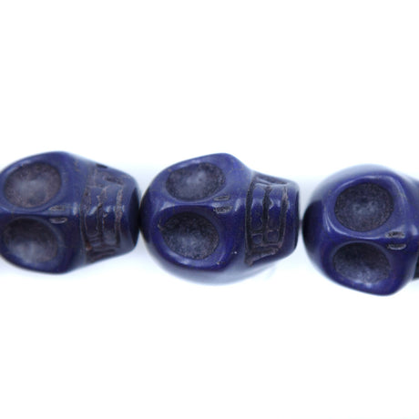 5ST50-DB: 23x18mm Lapis Magnesite Skull Beads 15.5"