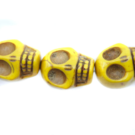 5ST50-Y: 23x18mm Yellow Magnesite Skull Beads 15.5"