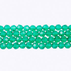 6CG285: 6mm Blue Zircon Glass Faceted Round