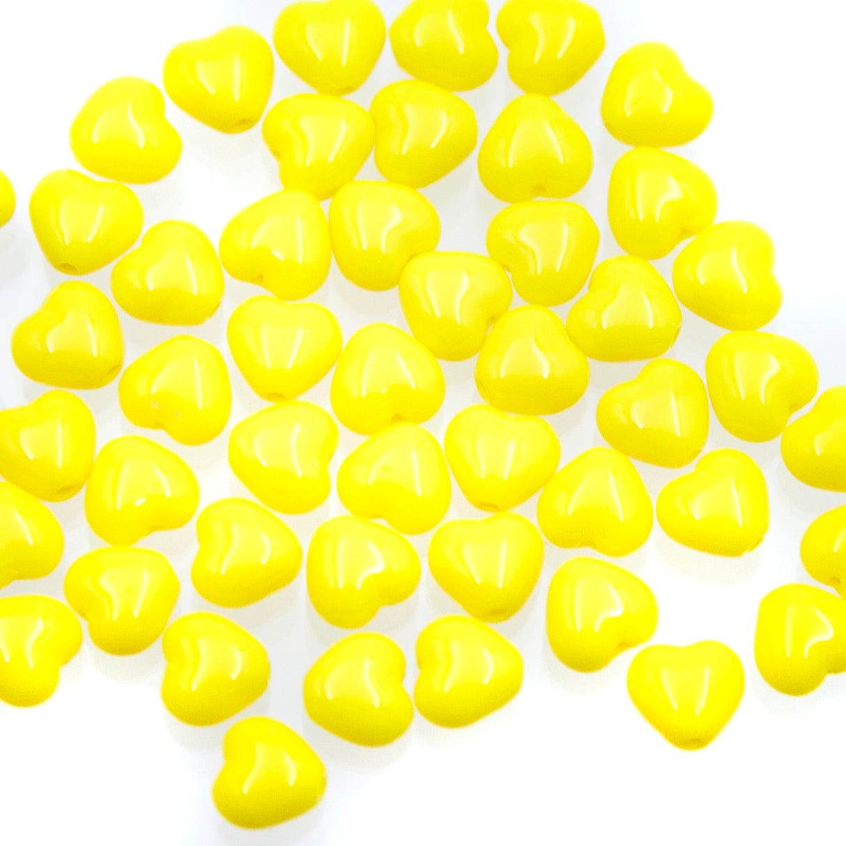 6HT125: CZ Heart Opaque Yellow 6mm 50 Pieces