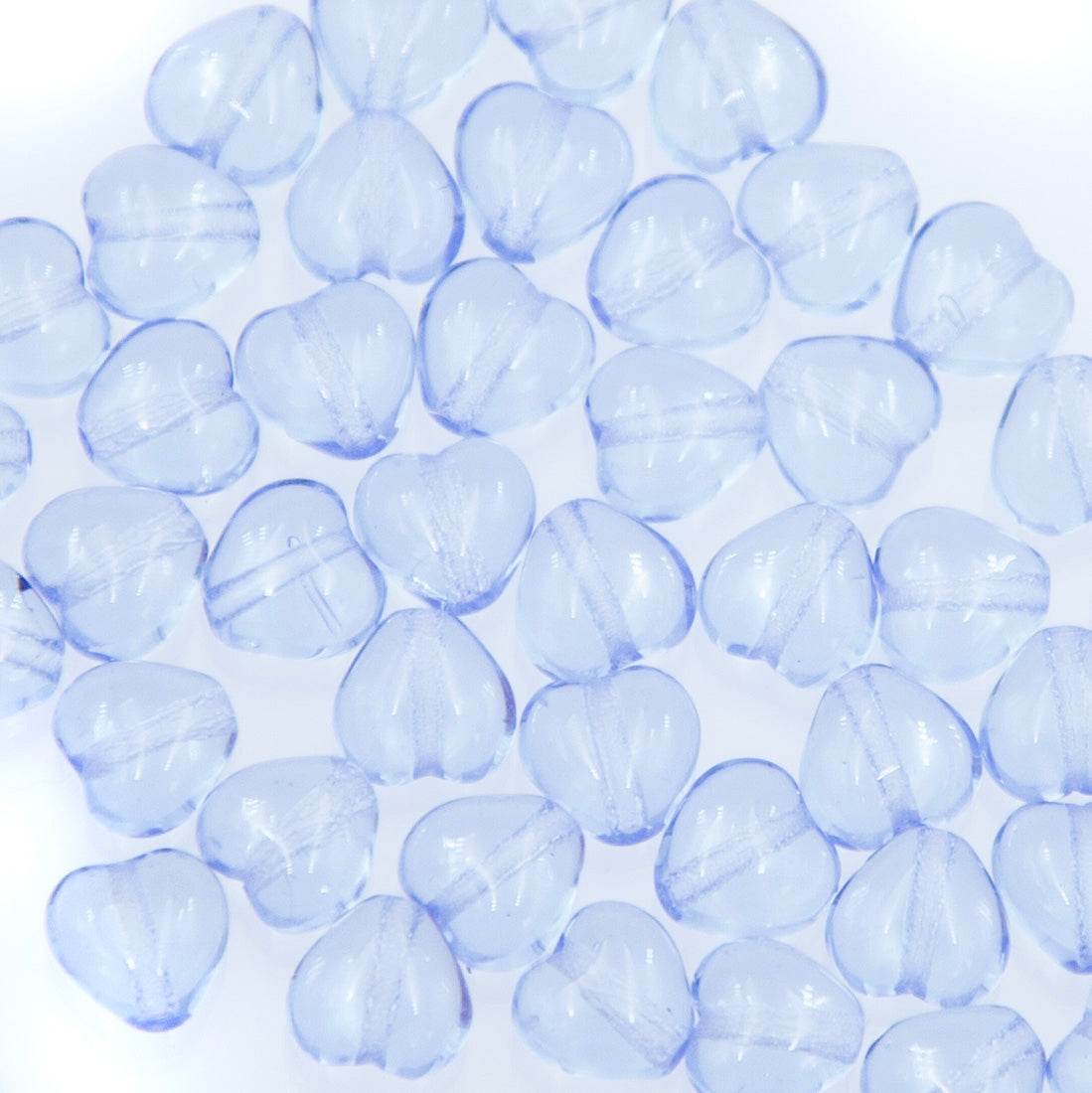 6HT272: CZ Heart Pale Sapphire 6mm 50 Pieces