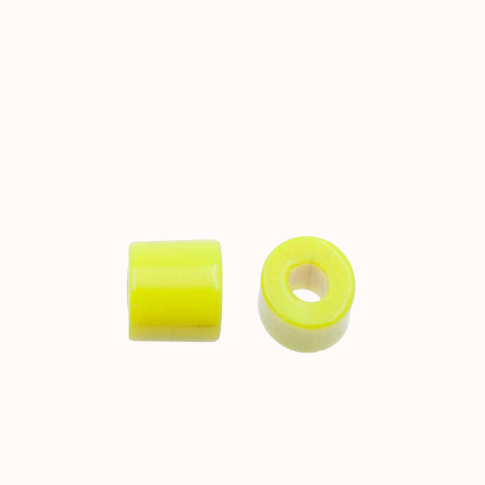6IN126: India Tile Bead Yellow 6mm - 50GM