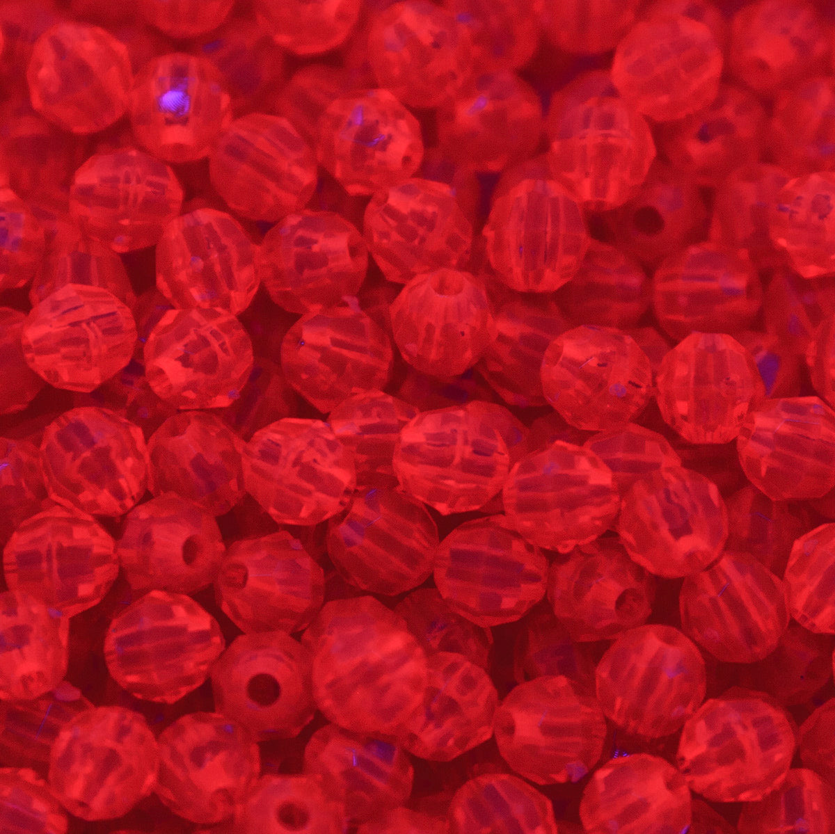 6PF238: Plastic Round Faceted Transparent Orange 6mm 500PPK