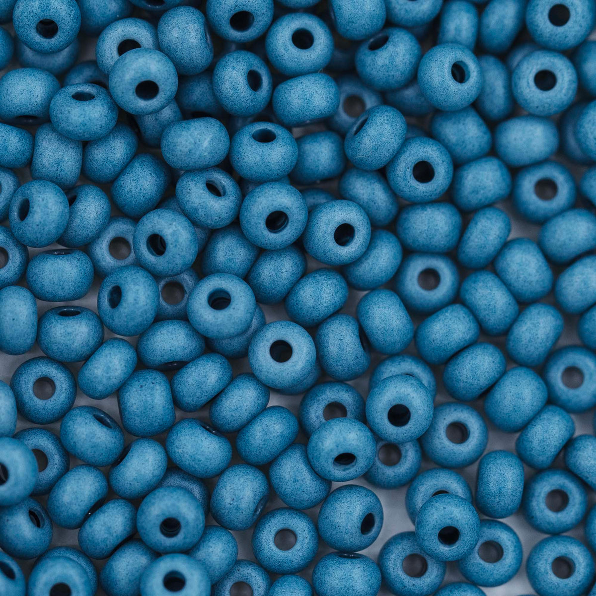 6SB167-TVL: CZ Seed Bead Opaque Deep Sea 6/0