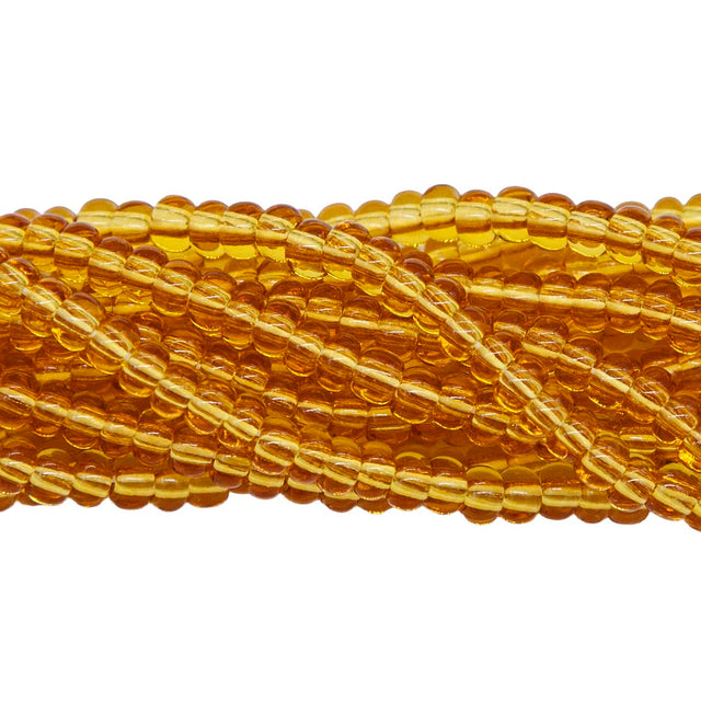 6SB254: CZ Seed Bead TR Topaz 6/0 36STR
