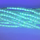 6SB712-NGR: CZ Seed Bead Colorlined Glow In The Dark 6/0-6STR