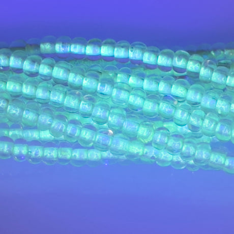 6SB712-NGR: CZ Seed Bead Colorlined Glow In The Dark 6/0-6STR