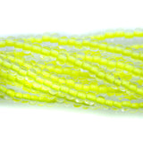 6SB723-N: CZ Seed Bead Neon Lined Yellow 6/0 Uv Reactive 36STR