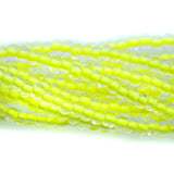 6SB723-NR: CZ Seed Bead Neon Lined Yellow 6/0 Uv Reactive-6STR