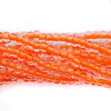 6SB734-N: CZ Seed Bead Neon Lined Orange 6/0 Uv Reactive 36STR