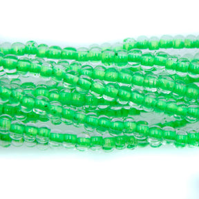 6SB784-N: CZ Seed Bead Neon Lined Green 6/0 Uv Reactive 36STR