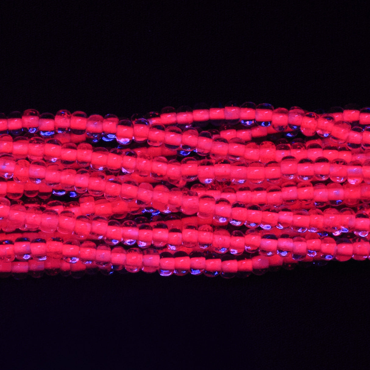 6SB793-N: CZ Seed Bead Neon Lined Pink 6/0 Uv Reactive 36STR