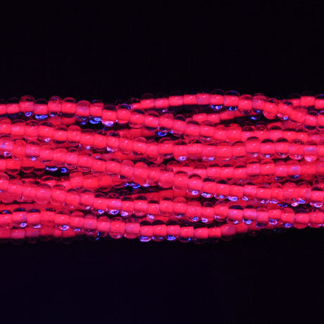 6SB793-N: CZ Seed Bead Neon Lined Pink 6/0 Uv Reactive 36STR