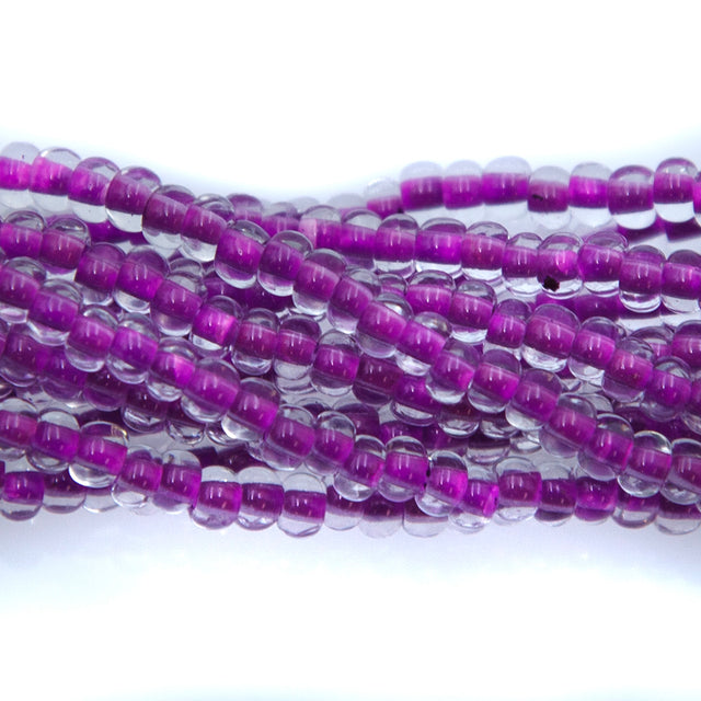 6SB798-N: CZ Seed Bead Neon Lined Purple 6/0 Uv Reactive 36STR