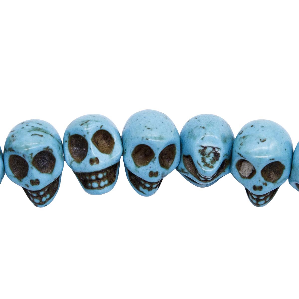 6ST50-B: 14x10mm Blue Magnesite Skull Beads 15.5"