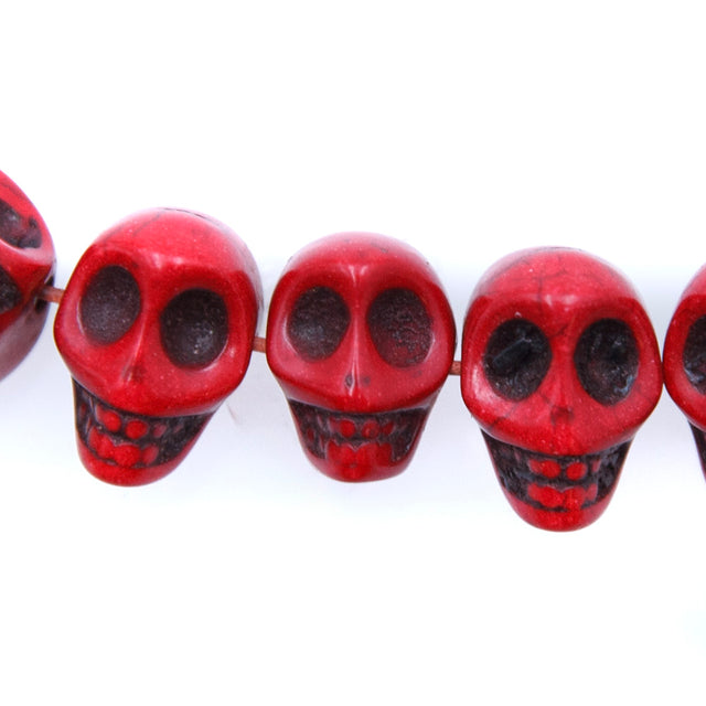 6ST50-R: 14x10mm Red Magnesite Skull Beads 15.5"