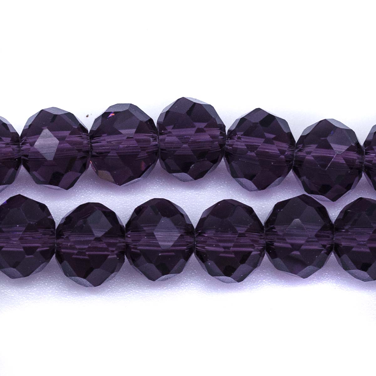 75CD297-D: Crystal Rondelle Dark Tanzanite 6x8mm 1 String