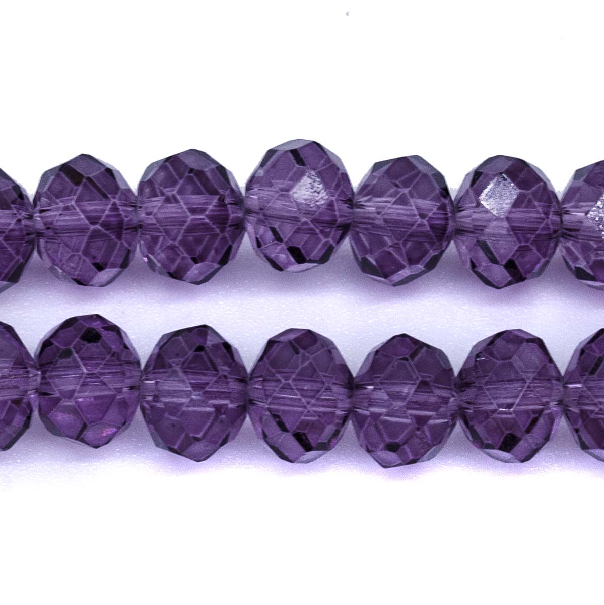 75CD297:  Crystal Faceted Rondell Tanzanite 6x8mm - 1 String