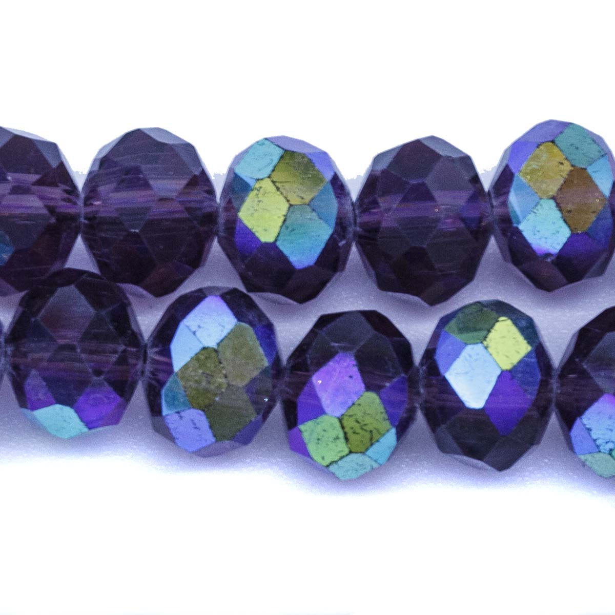 77CD597: Cut Crystal Round Rondelle Tanzanite Aurora Borealis Finish 8x10mm 1 15" String
