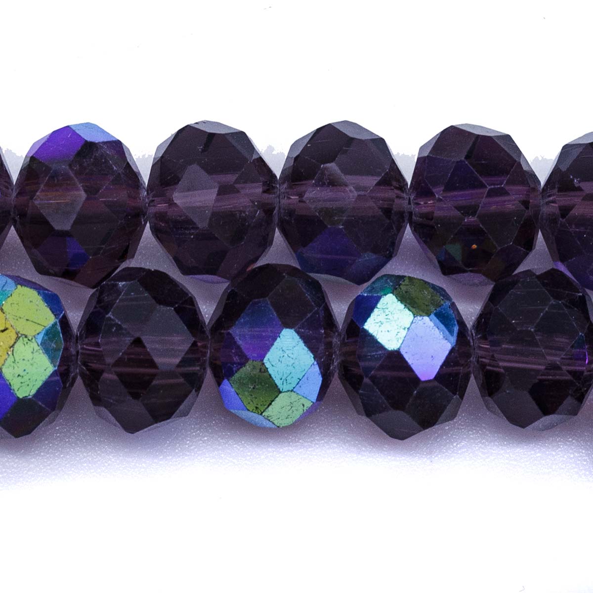 77CD597: Cut Crystal Round Rondelle Tanzanite Aurora Borealis Finish 8x10mm 1 15" String