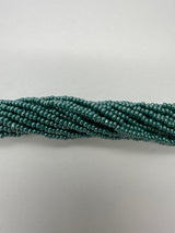 11SB386-CR: CZ Seed Bead True Cut Sfinx DK Green 11/0 - 1HK