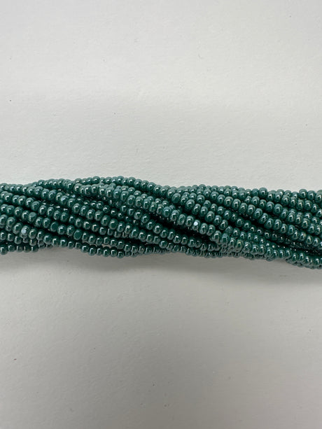 11SB386-CR: CZ Seed Bead True Cut Sfinx Dark Green 11/0 - 1HK