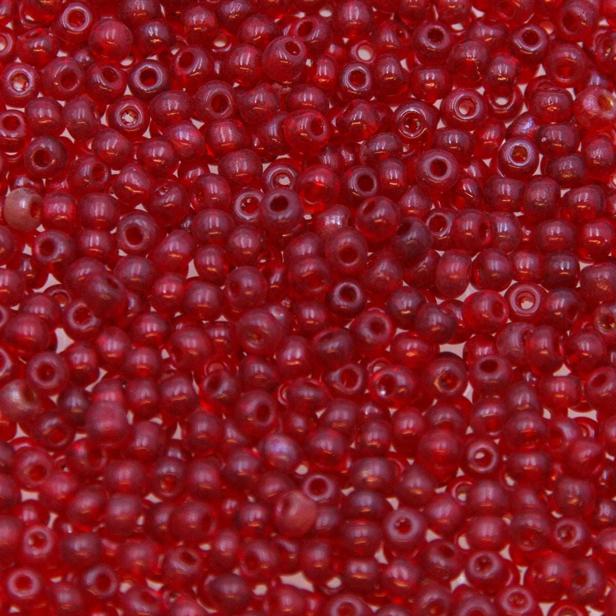 7SV246-2R1: Vin Ven Seed Bead Transparent Garnet #2 7/0 - 50 GM