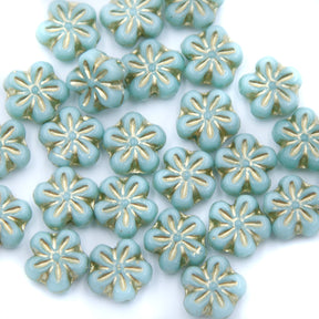 8FL160-G: CZ Flower Blue with Gold Luster 8mm 25 Pieces