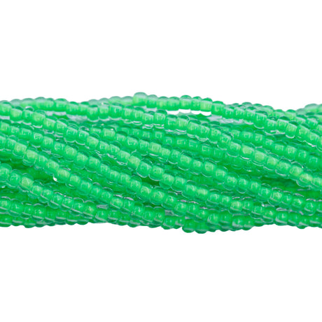 8SB784-NR: CZ Seed Bead Neon Lined Green 8/0 Uv Reactive 1 HK