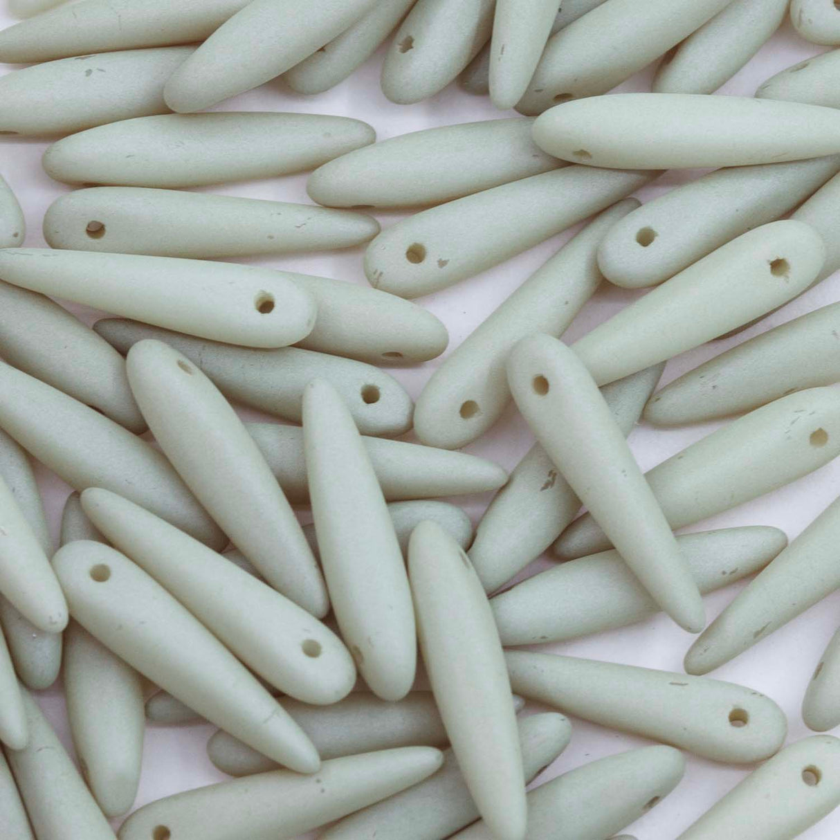 91DP605-M: Preciosa Ornela 5x16mm White Alabaster Light Olivine Beige Matt Thorn Beads