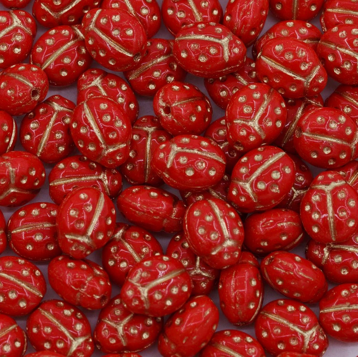 92LB144-G: CZ Ladybug Red Gold Inlay 7x10mm 150Pc