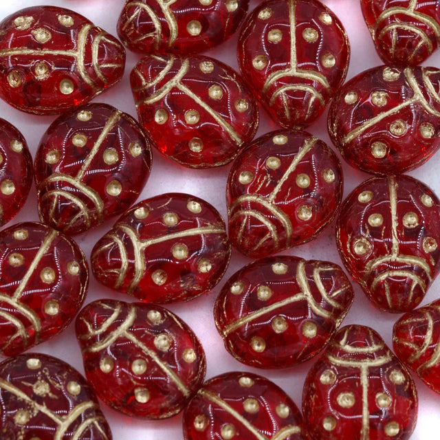 95LB244-GR: CZ Ladybug Red Gold Inlay 11x14mm 25 Pieces