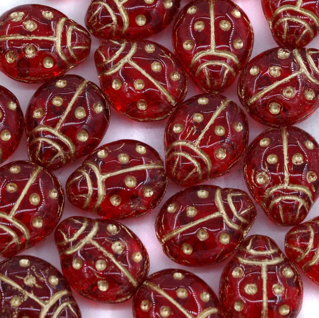 95LB244-G: CZ Ladybug Red Gold Inlay 11x14mm 150 Pieces