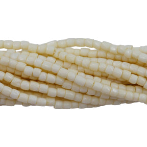 9SC150: CZ Seed Bead 3-cut Bone 9/0 5HK