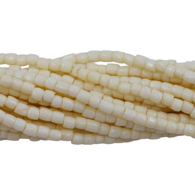 9SC150: CZ Seed Bead 3-cut Bone 9/0 5HK