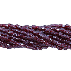 9SC346-TR: CZ Seed Bead 3-cut Garnet Sfinx 9/0 1HK