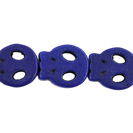 9ST50-DB: 13x15mm Lapis Magnesite Skull Beads 15.5"