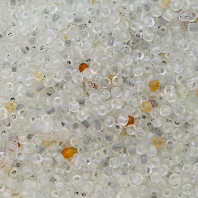 9SV100-13: Vintage Venetian Sh Transparent Milky Crystal 9/0 250 Grams