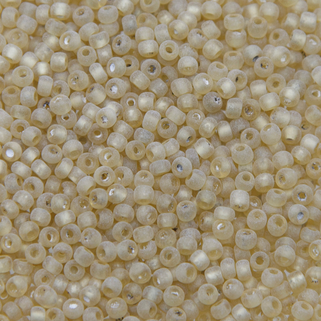 9SV100-5: Vintage Venetian Transparent Dusty White Crystal 9/0 250 Grams