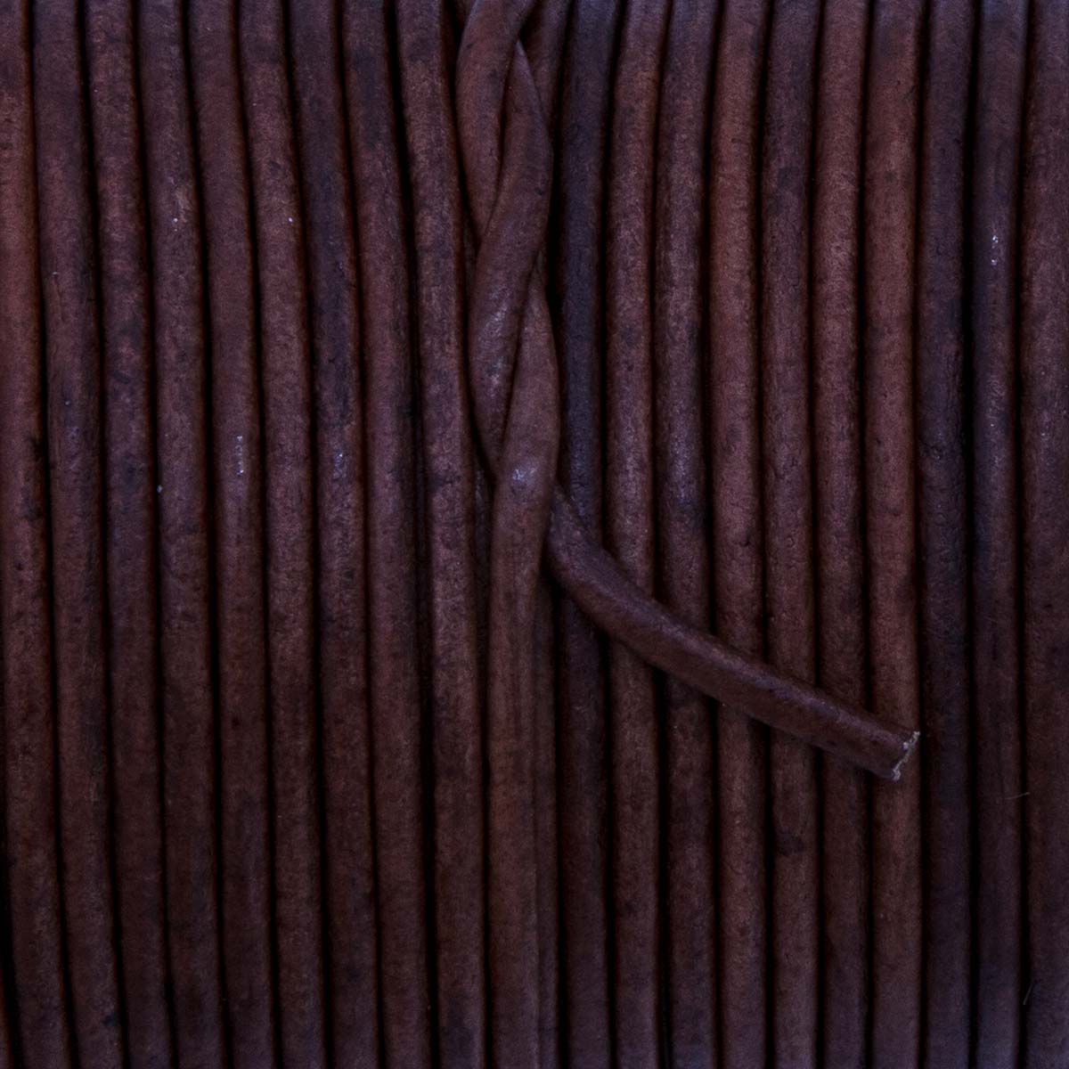 RL2520-0403: Round Leather Lace Spool Mahogany 2mm 25yds