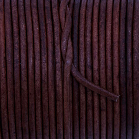 RL2520-0403: Round Leather Lace Spool Mahogany 2mm 25yds
