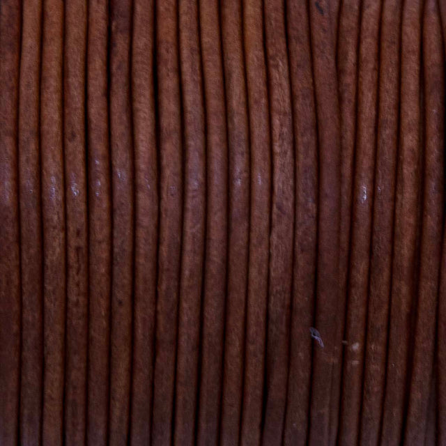 RL2520-0409: Round Leather Lace Spool Cedar 2mm 25yds