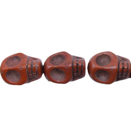 ST50-CO: 18x13mm Coffee Magnesite Skull Beads 15.5"