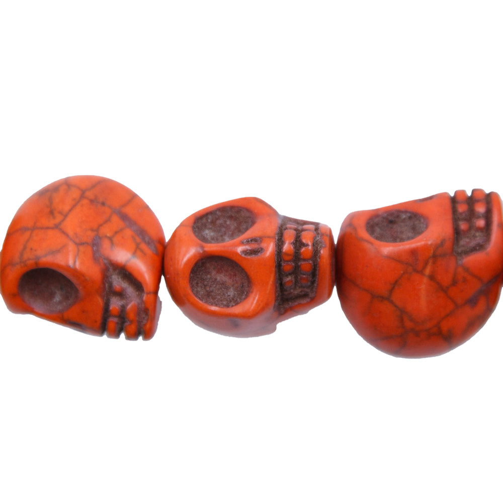 ST50-O: 18x13mm Orange Magnesite Skull Beads 15.5"
