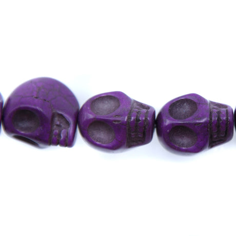 ST50-PR: 18x13mm Purple Magnesite Skull Beads 15.5"