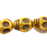 ST50-Y: Skulls Magnesite Yellow 13x18mm