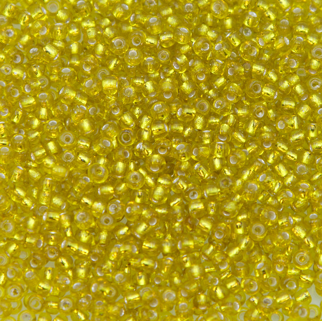 SV100-105: Vintage Venetian Seed Bead Silverlined Yellow 10/0 - 250 Grams